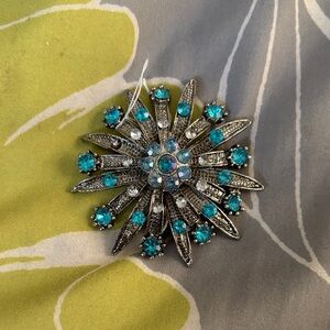 Elegant Silver and Blue Brooch